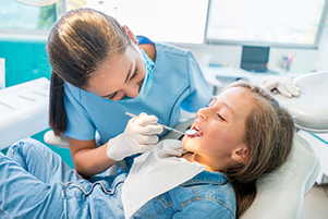Little girl in dental chair at Riverwind Dental in Richmond, VA