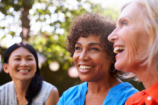 Group of older women with dental implants from Riverwind Dental in Richmond, VA